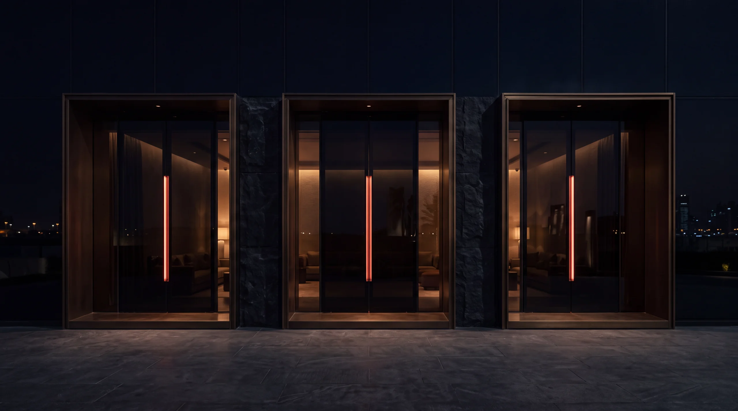 Three illuminated entrances to a contemporary private majlis